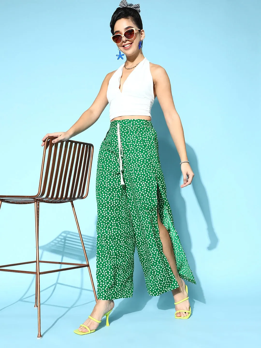 Berrylush Women Green & White Floral Printed Mid-Rise Tie-Up Waist Side-Slit Tapered Regular Trousers