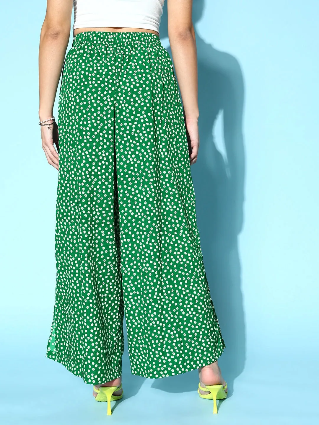 Berrylush Women Green & White Floral Printed Mid-Rise Tie-Up Waist Side-Slit Tapered Regular Trousers