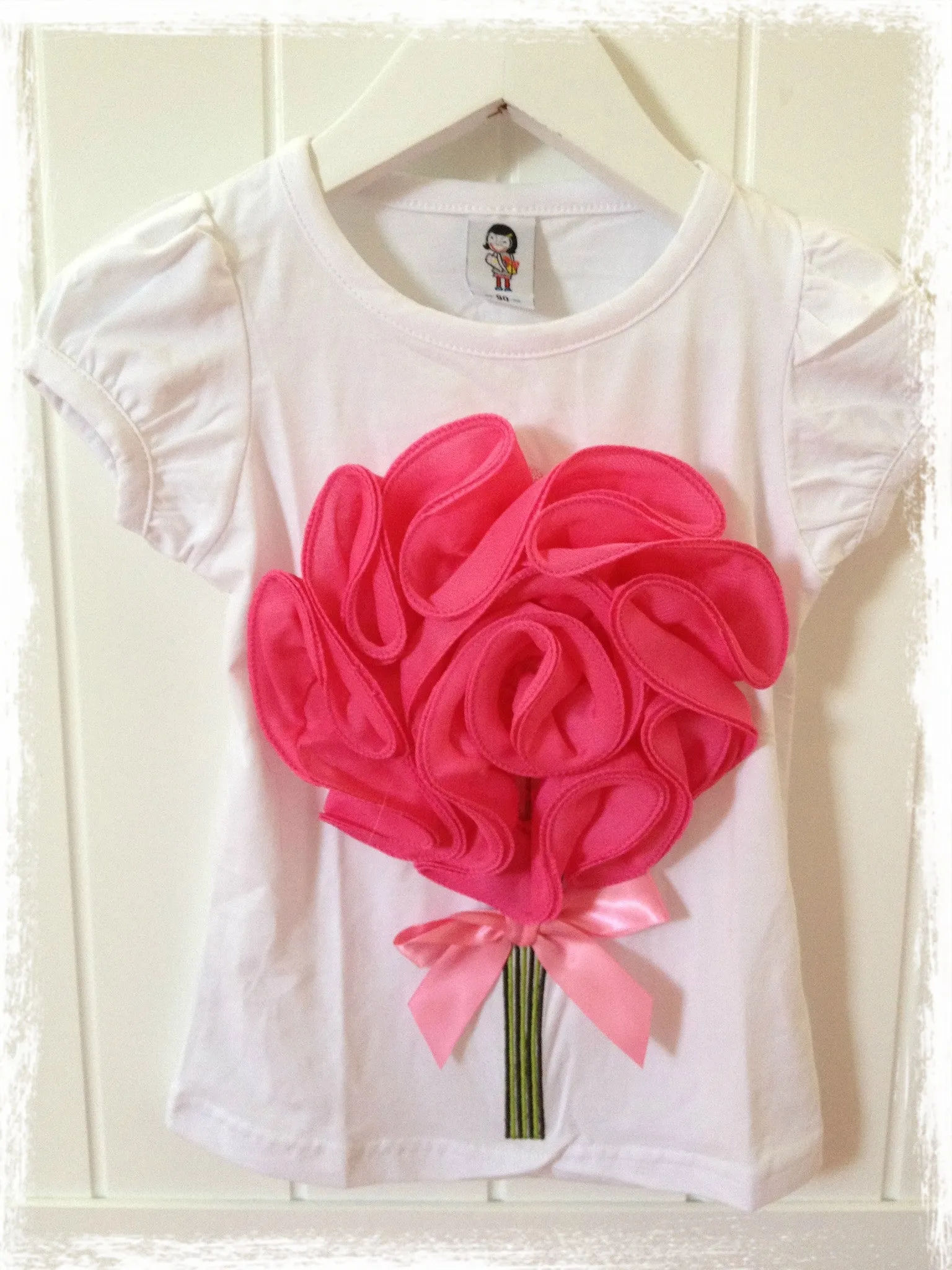 Girl white hot pink flower top. SHIRT03