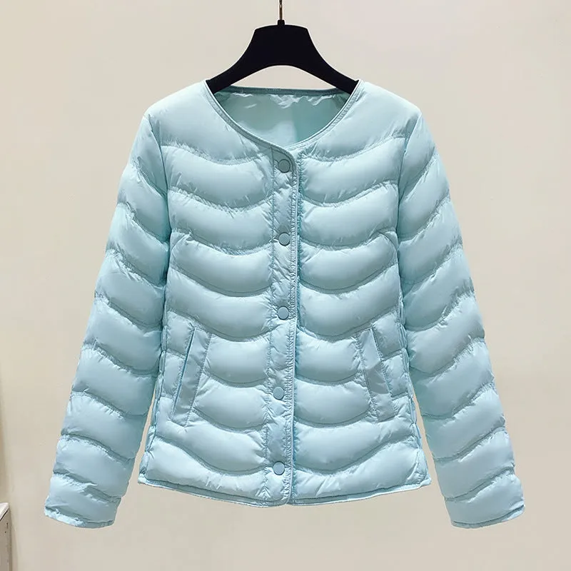 The inner tank keeps warm and light small cotton clothes for women's autumn and winter new 2025 round neck short cotton jacket for small people to wear cotton clothes outside