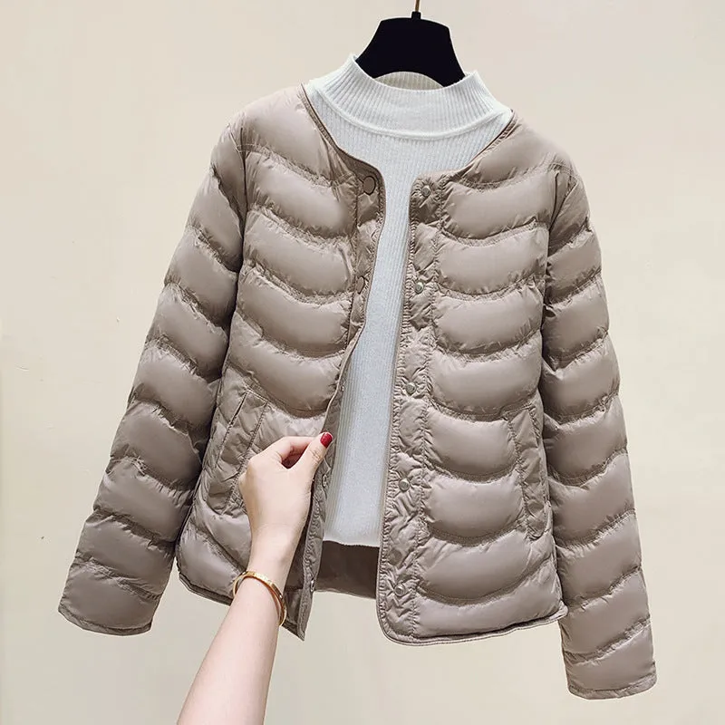 The inner tank keeps warm and light small cotton clothes for women's autumn and winter new 2025 round neck short cotton jacket for small people to wear cotton clothes outside