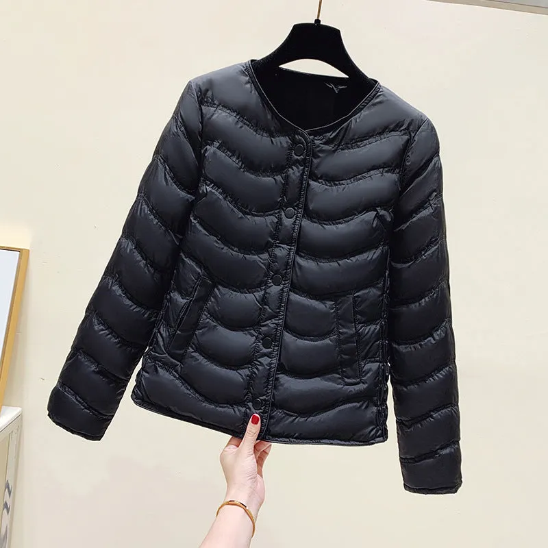 The inner tank keeps warm and light small cotton clothes for women's autumn and winter new 2025 round neck short cotton jacket for small people to wear cotton clothes outside