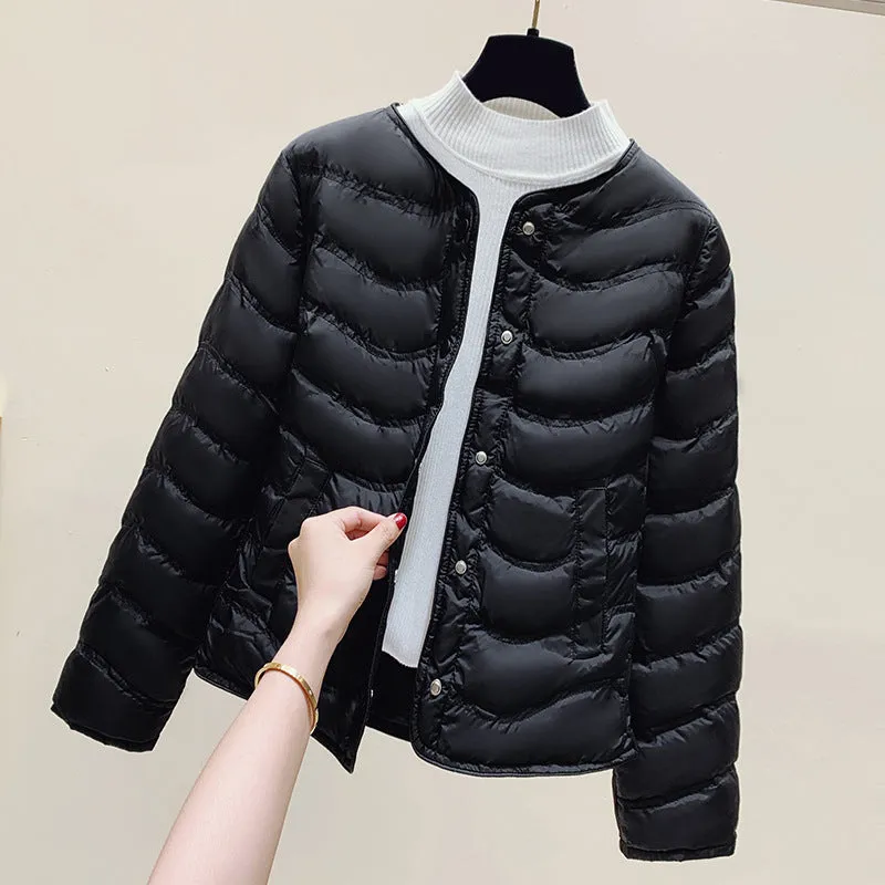 The inner tank keeps warm and light small cotton clothes for women's autumn and winter new 2025 round neck short cotton jacket for small people to wear cotton clothes outside